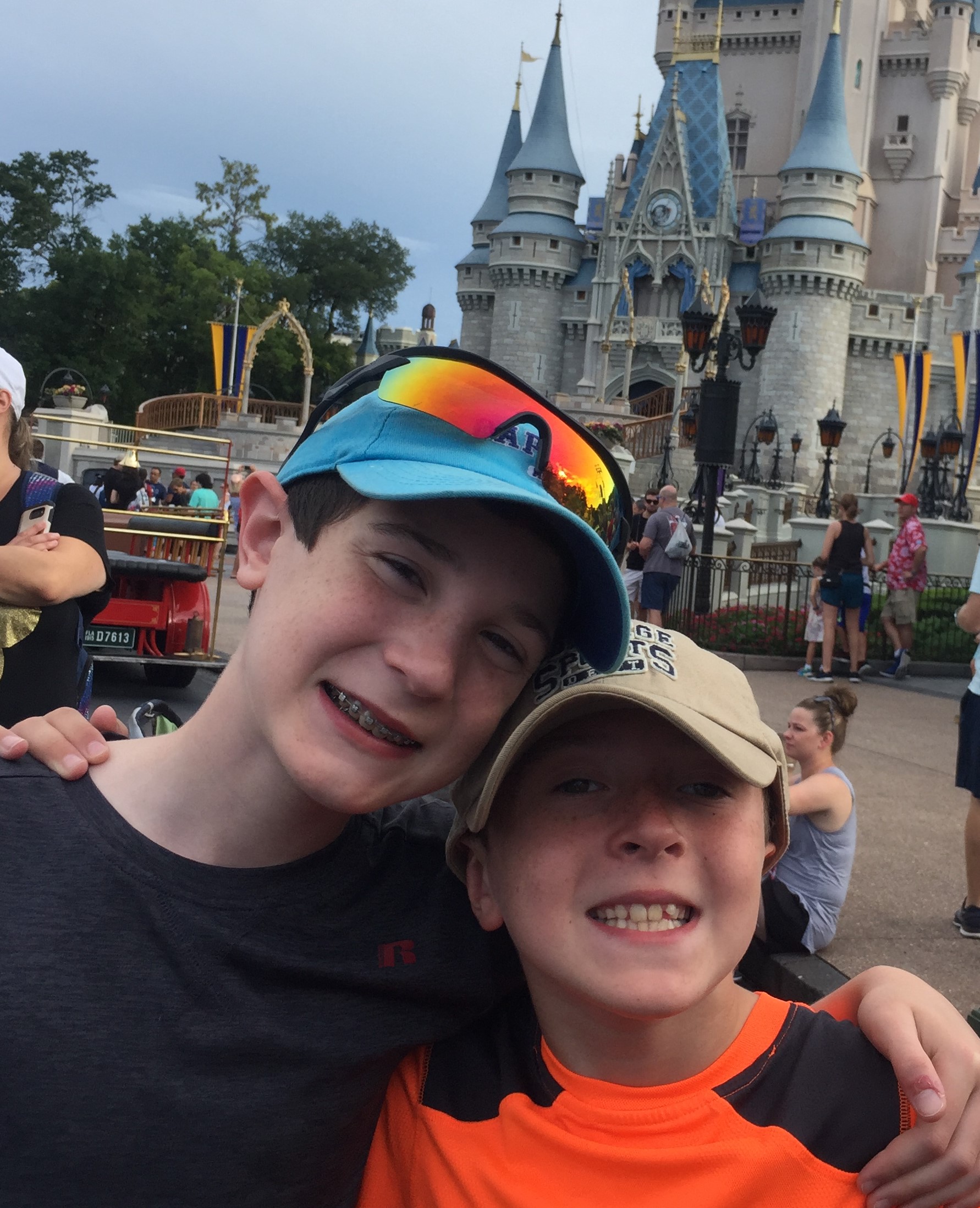 matt and charlie smiling at castle at disney 2019