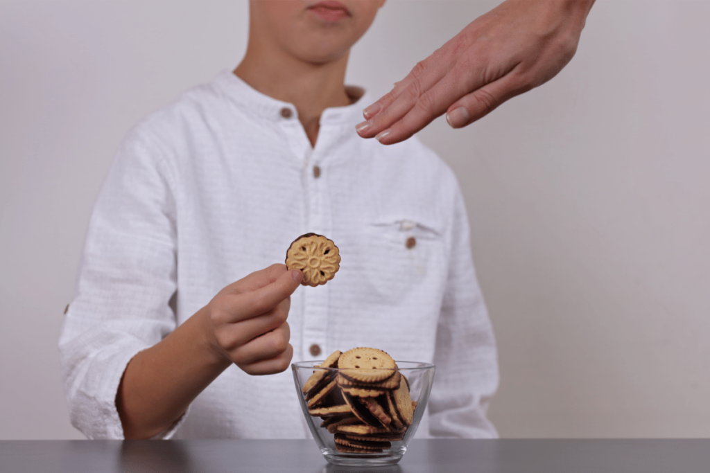Child about to eat a cookie